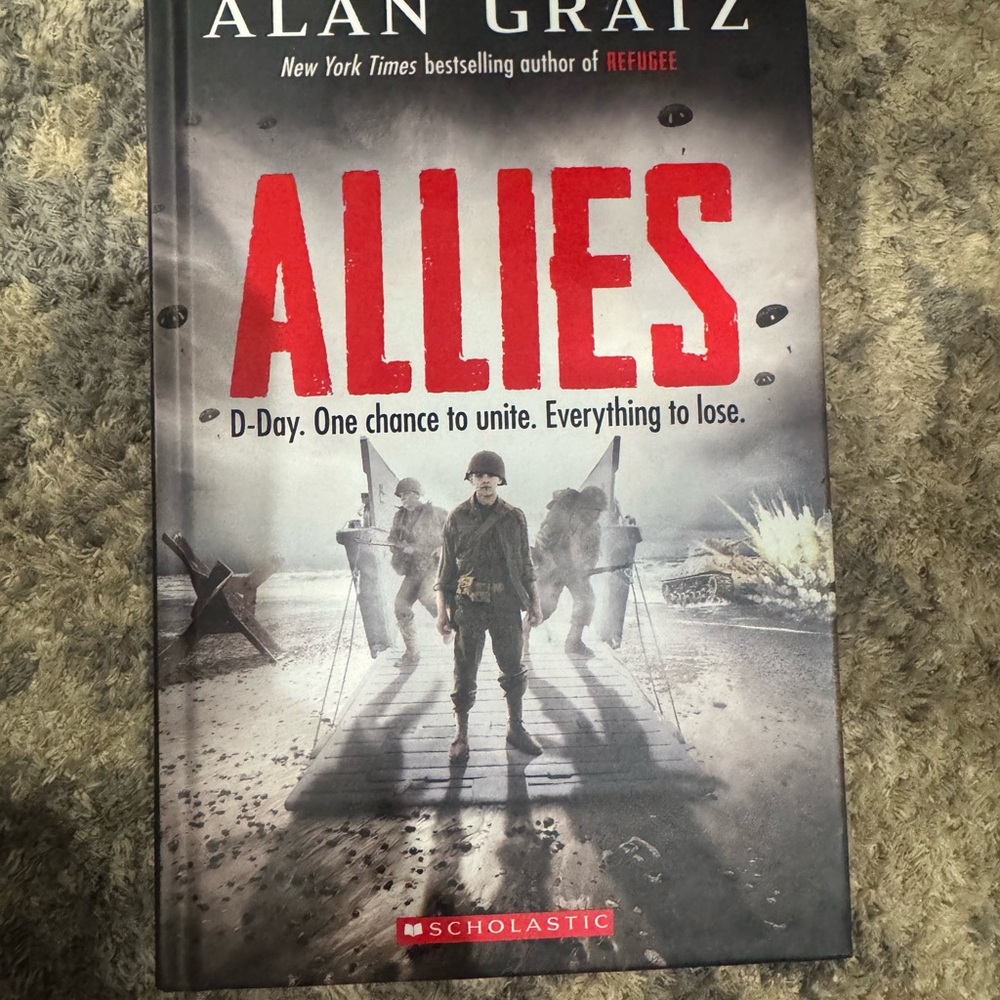 Scholastic Hardcover Book with Red and Black Accents